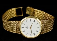 An 18 ct gold Omega gentleman's wristwatch The white dial with Roman numerals,