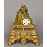 A 19th century ormolu cased figural mantel clock The white enamelled dial with Roman numerals,
