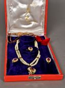 A suite of Indian jewellery Comprising: a two-strand necklace with a pendant,
