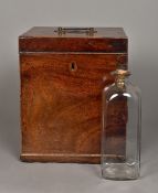 A George III mahogany decanter box Of hinged square form with line inlaid top and with a loop