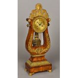 A 19th century French gilt bronze mounted mantel clock Of lyre form,
