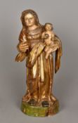 A 17th/18th century Continental carved wood and polychrome decorated figure of the Madonna and