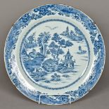A large 18th/19th century Chinese blue and white charger Of dished form,
