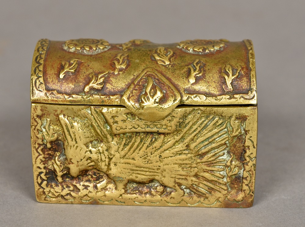 A French cast bronze miniature casket Worked with various royal crests and heraldic badges.