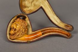 A 19th century Meerschaum pipe The bowl carved as a lion, housed in a plush lined leather box. 15.