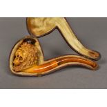 A 19th century Meerschaum pipe The bowl carved as a lion, housed in a plush lined leather box. 15.