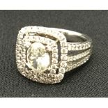 A white gold and diamond ring The central stone approximately 1.