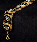 A pietre dura bracelet Set with six specimen stone floral roundels. 15 cm long.