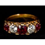 An 18 ct gold diamond and ruby five stone ring Set with three rubies interspersed with two diamonds,