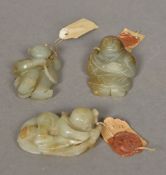 Three Chinese jade carvings Each of figural form, each with applied wax sealed paper label.