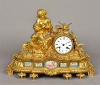 A 19th century French Sevres type panel inset ormolu cased figural mantel clock retailed by J