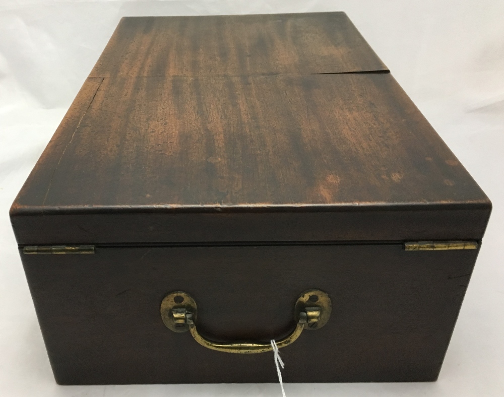 A George III mahogany travelling writing box The hinged twin flap top enclosing an adjustable baize - Image 5 of 8