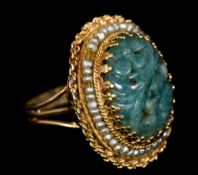 An unmarked gold, jade and seed pearl ring Of domed form,