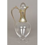 A silver mounted Dartington glass claret jug, hallmarked London 2000,