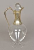 A silver mounted Dartington glass claret jug, hallmarked London 2000,