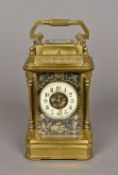 A bronze cased repeating carriage clock retailed by Bailey Banks & Biddle The signed dial with