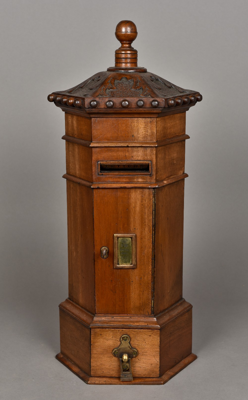 A Victorian style country house table top pillar box Of hexagonal form with brass fittings.