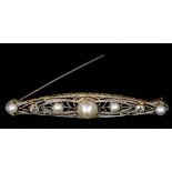 An unmarked pierced navette form bar brooch Set with diamonds and pearls. 6.25 cm long.