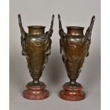 A pair of 19th century Art Nouveau patinated bronze vases Each of twin handled form,