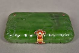 A Russian gold, enamel, diamond and ruby mounted jade cigarette case The case carved as elephants.