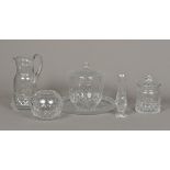 A group of cut lead crystal glass items Comprising: a jug, a biscuit barrel, a bonbon jar and cover,