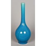 A Chinese porcelain bottle vase With allover turquoise glaze. 46 cm high.