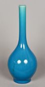 A Chinese porcelain bottle vase With allover turquoise glaze. 46 cm high.