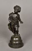 A 19th century patinated bronze model of a bacchic putto Modelled holding a bunch of grapes,