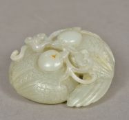 A Chinese carved white jade group Worked as a pair of ducks holding lingzhi. 8 cm wide.