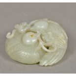 A Chinese carved white jade group Worked as a pair of ducks holding lingzhi. 8 cm wide.