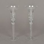 A pair of cut lead crystal glass candlesticks Each of flared form with facet and floral cut