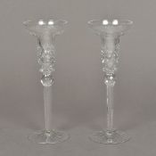 A pair of cut lead crystal glass candlesticks Each of flared form with facet and floral cut