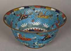 A Chinese cloisonne bowl Typically decorated with horses and aquatic scenes,