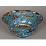 A Chinese cloisonne bowl Typically decorated with horses and aquatic scenes,