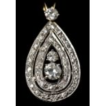 An unmarked white gold, diamond set pendant Of drop form, centrally set with a 0.