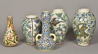 A collection of five Isnik type pottery vases Each typically decorated. The largest 33 cm high.