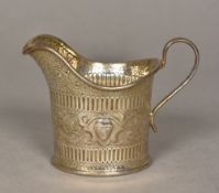 A George II silver cream jug,