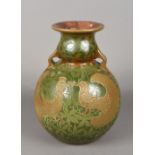 A late 19th/early 20th century Continental pottery twin handled double gourd vase Tube line