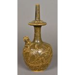 A Chinese pottery water vase The spout modelled as a mythical beast,