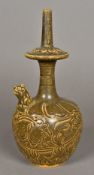 A Chinese pottery water vase The spout modelled as a mythical beast,