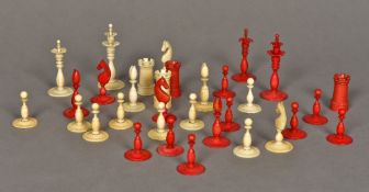 A 19th century English Calvert style 'floral' ivory and stained ivory chess set Housed in a wooden