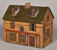 A 19th century polychrome painted wooden tea caddy Modelled in the form of a rustic cottage,