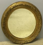 A 19th century gilt framed mirror The oval plate within acanthus scroll and floral spray border.