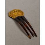 A 19th century unmarked yellow metal mounted tortoiseshell hair comb Of three prong form,