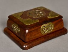 A Chinese brass mounted hardwood box and cover Mounted on a hardwood stand. 14.5 cm wide.