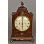 An early 19th century mahogany bracket clock Of stepped architectural form with gilt metal mounts,