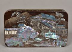 A late 19th century Japanese lacquered tin Of hinged rounded rectangular form,