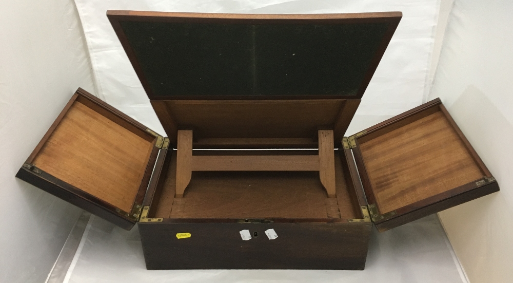 A George III mahogany travelling writing box The hinged twin flap top enclosing an adjustable baize - Image 8 of 8