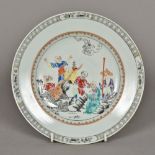 A Chinese Export porcelain plate Centrally decorated with various figures. 22 cm diameter.