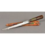 A 19th century Eastern dagger The wire inlaid and over set carved wooden handle,